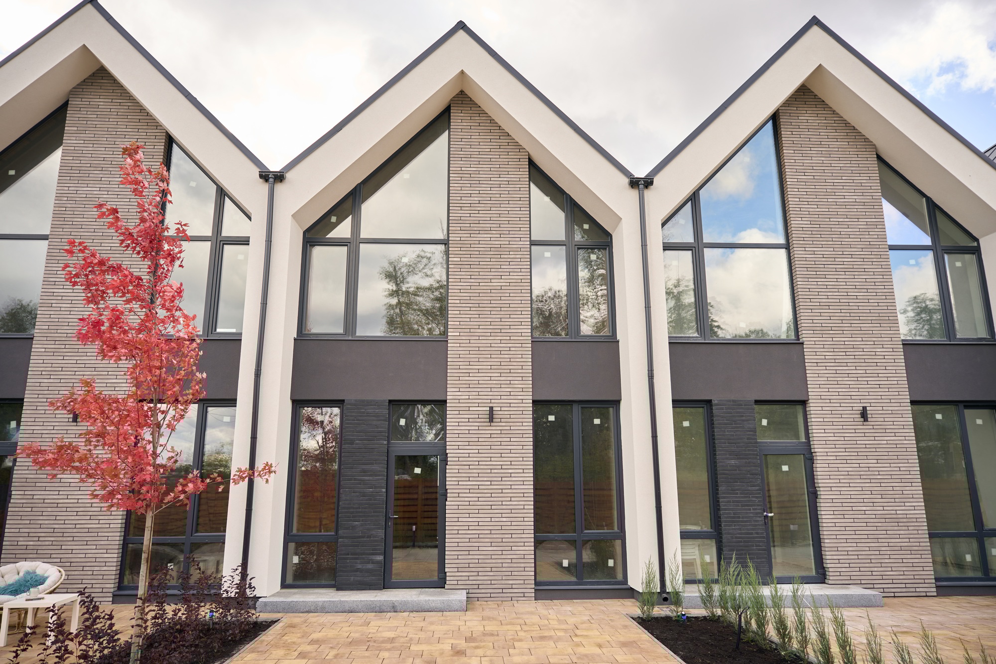 Fronts of modern houses lined up to each other